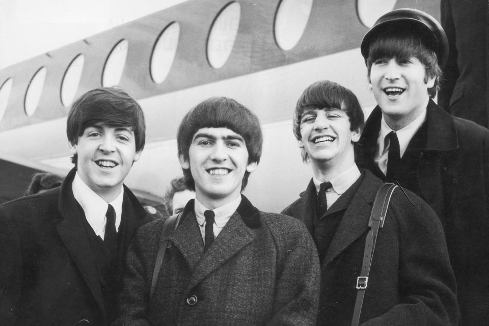 <p>The Beatles arriving in London in 1964.</p>