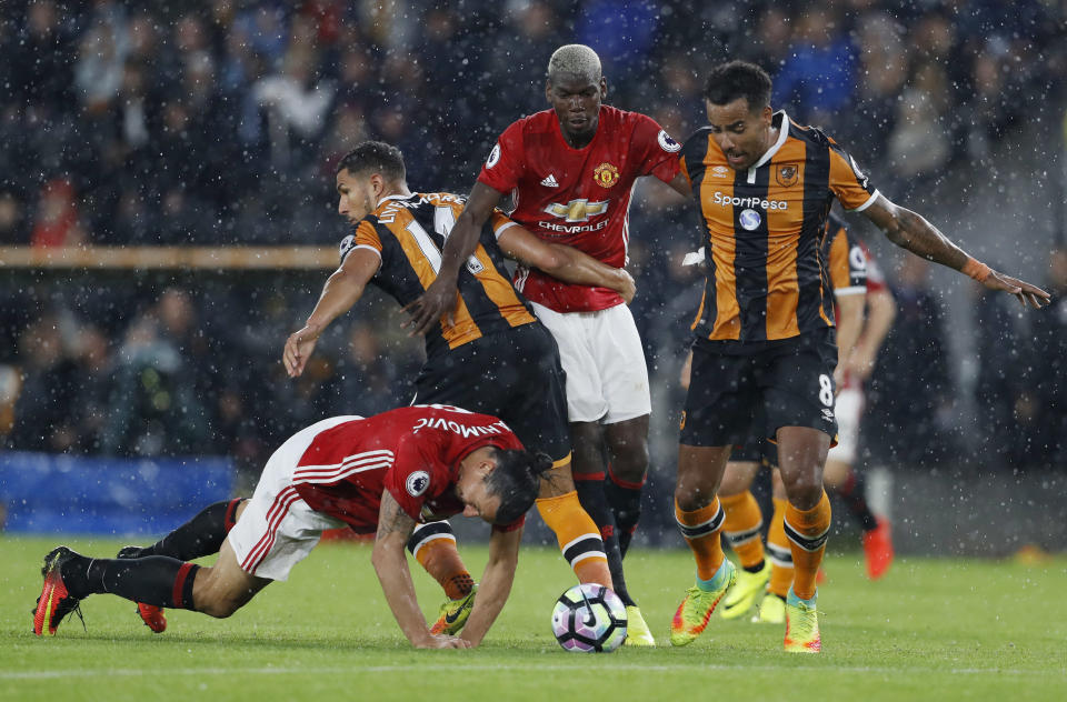 Football Soccer Britain- Hull City v Manchester United - Premier League - The Kingston Communications Stadium - 27/8/16 Manchester United's Paul Pogba and Zlatan Ibrahimovic in action with Hull City's Jake Livermore and Tom Huddlestone Action Images via Reuters / Lee Smith Livepic EDITORIAL USE ONLY. No use with unauthorized audio, video, data, fixture lists, club/league logos or "live" services. Online in-match use limited to 45 images, no video emulation. No use in betting, games or single club/league/player publications. Please contact your account representative for further details.