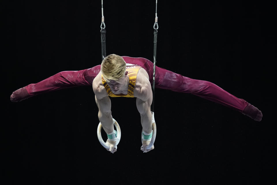 Shane Wiskus, representing the University of Minnesota, competes during the Winter Cup gymnastics event Friday, Feb. 26, 2021, in Indianapolis. The University of Minnesota and the University of Iowa will stop offering men's gymnastics as a scholarship sport at the end of the month. Wiskus wants to be part of the U.S. Olympic gymnastics team. It's one of the reasons he left Minnesota last fall for the U.S. Olympic and Paralympic Training Center in Colorado Springs, Colorado. (AP Photo/Darron Cummings)