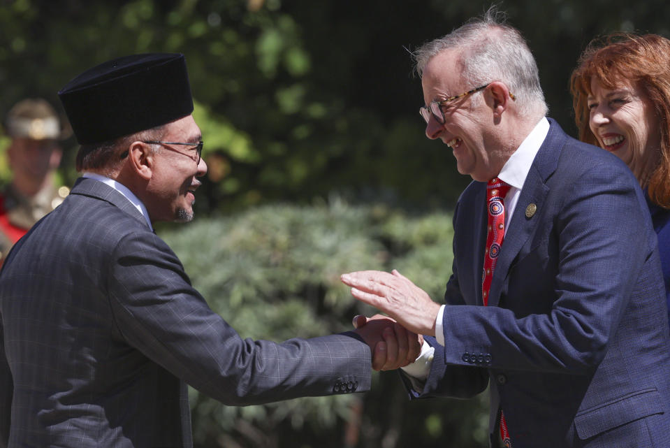 Australian Prime Minister Anthony Albanese welcomes the Prime Minister of Malaysia Anwar Ibrahim, left, to the ASEAN-Australia Special Summit in Melbourne, Australia, Monday, March 4, 2024. An increasingly assertive China and a humanitarian crisis in Myanmar are likely to be high on the agenda when Southeast Asian leaders meet in Australia for a rare summit March 4-6. (AP Photo/Hamish Blair)