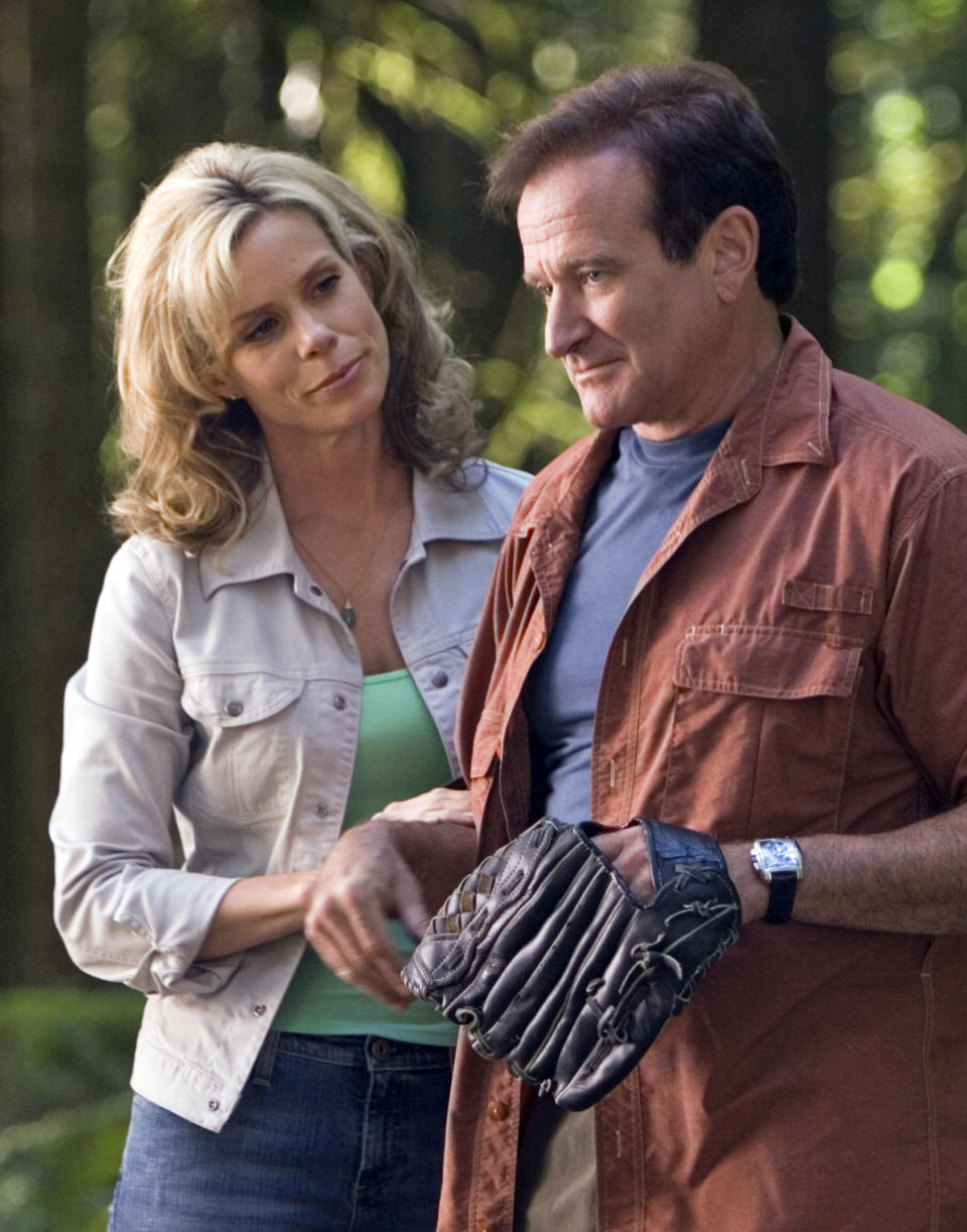 This undated photo released by Columbia Pictures shows actress Cheryl Hines, left, and Robin Williams in a scene from the family-adventure comedy "RV." (AP Photo/Columbia Pictures, Joe Lederer)