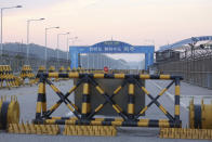 Barricades are placed near the Unification Bridge which leads to the border village of Panmunjom in the Demilitarized Zone in Paju, South Korea. Tuesday, June 16, 2020. North Korea blew up an inter-Korean liaison office building just inside its border in an act Tuesday that sharply raises tensions on the Korean Peninsula amid deadlocked nuclear diplomacy with the United States. (AP Photo/Ahn Young-joon)