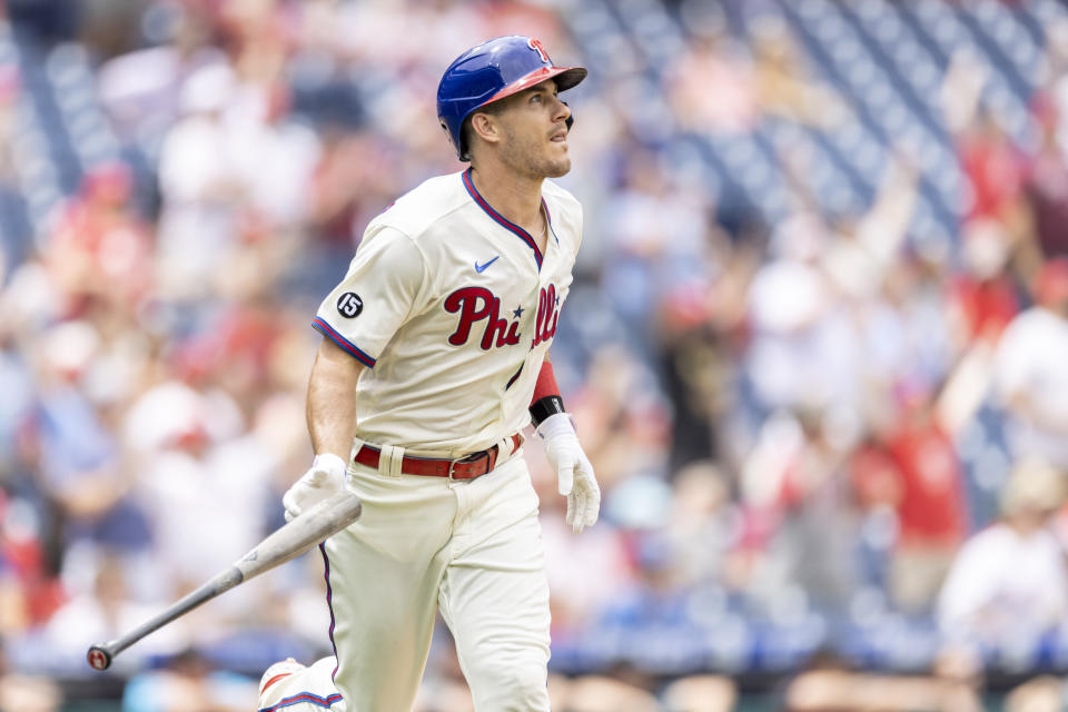 Philadelphia Phillies' J.T. Realmuto (10) watches his ball after hitting the winning home run in the 10th inning of a baseball game against the Miami Marlins, Sunday, July 18, 2021, in Philadelphia. It was a continuation of the previous day's game which was suspended due to rain. (AP Photo/Laurence Kesterson)