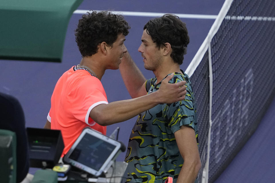 Taylor Fritz, right, greets Ben Shelton after defeating him at the BNP Paribas Open tennis tournament Saturday, March 11, 2023, in Indian Wells, Calif. (AP Photo/Mark J. Terrill)