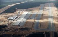 An aerial view shows the new Sao Goncalo do Amarante international airport, built in preparation for increased traffic during the 2014 soccer World Cup, in Natal January 22, 2014. REUTERS/Sergio Moraes