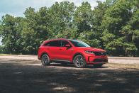 <p>With more powertrain options and a smaller footprint, the 2022 Kia Sorento is a compelling substitute for the larger <a href="https://www.caranddriver.com/kia/telluride" rel="nofollow noopener" target="_blank" data-ylk="slk:Kia Telluride;elm:context_link;itc:0;sec:content-canvas" class="link ">Kia Telluride</a>. Both <a href="https://www.caranddriver.com/kia" rel="nofollow noopener" target="_blank" data-ylk="slk:Kia;elm:context_link;itc:0;sec:content-canvas" class="link ">Kia</a> models are handsome and have three rows, but adults won't want to spend much time in the Sorento's far-back seats, and when those seats are upright they limit its cargo capacity. Keep the third row stowed, however, and its nicely appointed cabin becomes a comfortable place for a small family. Unlike the Telluride, the Sorento is available as a hybrid or plug-in hybrid, which help maximize fuel efficiency. No matter what's providing the motivation, the Kia has a smooth ride and satisfying handling characteristics. The entire package is cohesive and packed with popular standard and optional features, making the 2022 Sorento one of the better options in its class and an <a href="https://www.caranddriver.com/features/a38873223/2022-editors-choice/" rel="nofollow noopener" target="_blank" data-ylk="slk:Editors' Choice award winner;elm:context_link;itc:0;sec:content-canvas" class="link ">Editors' Choice award winner</a>.</p><p><a class="link " href="https://www.caranddriver.com/kia/sorento" rel="nofollow noopener" target="_blank" data-ylk="slk:Review, Pricing, and Specs;elm:context_link;itc:0;sec:content-canvas">Review, Pricing, and Specs</a></p>