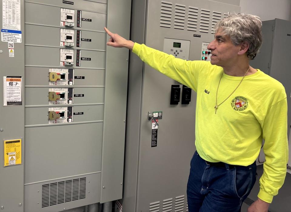 Nick Rico, the superintendent of the Wells Sanitary District, looks over the new equipment installed in the water treatment plant's electrical room on Eldridge Road in Wells, Maine, on March 7, 2024. The room caught fire and experienced much damage in January 2023.