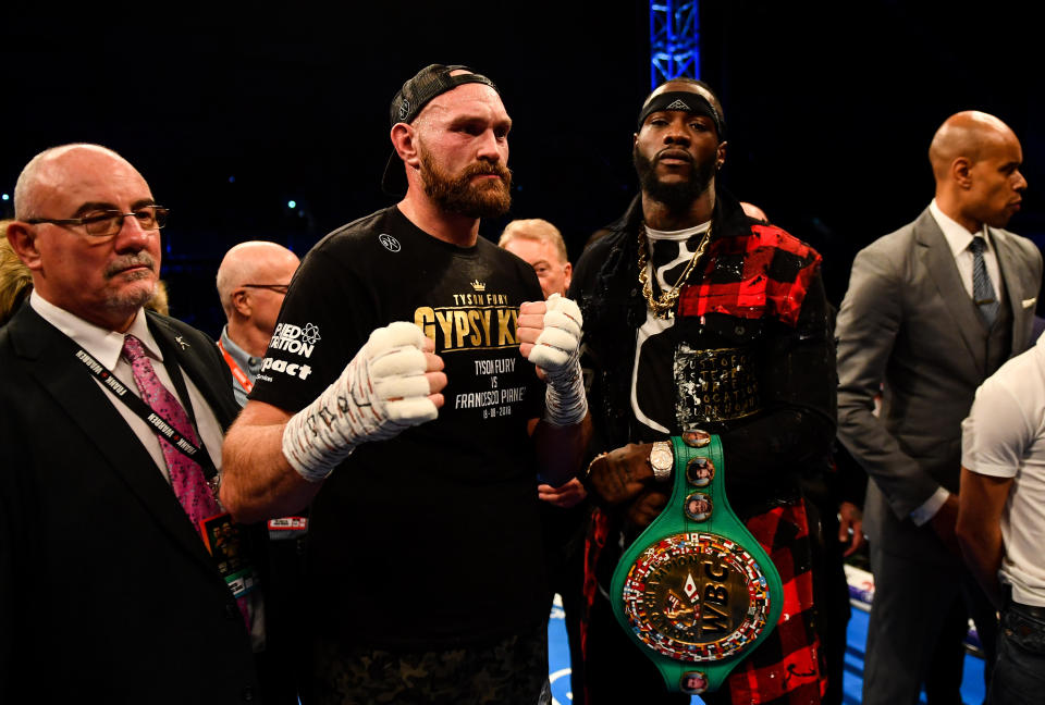 Linear heavyweight champion Tyson Fury (L) and WBC champion Deontay Wilder pose on Aug. 18 in Belfast after Fury defeated Francesco Pianeta. Wilder and Fury will meet in a pay-per-view bout on Dec. 1 in either Las Vegas or Los Angeles. (Ramsey Cardy/Sportsfile via Getty Images)