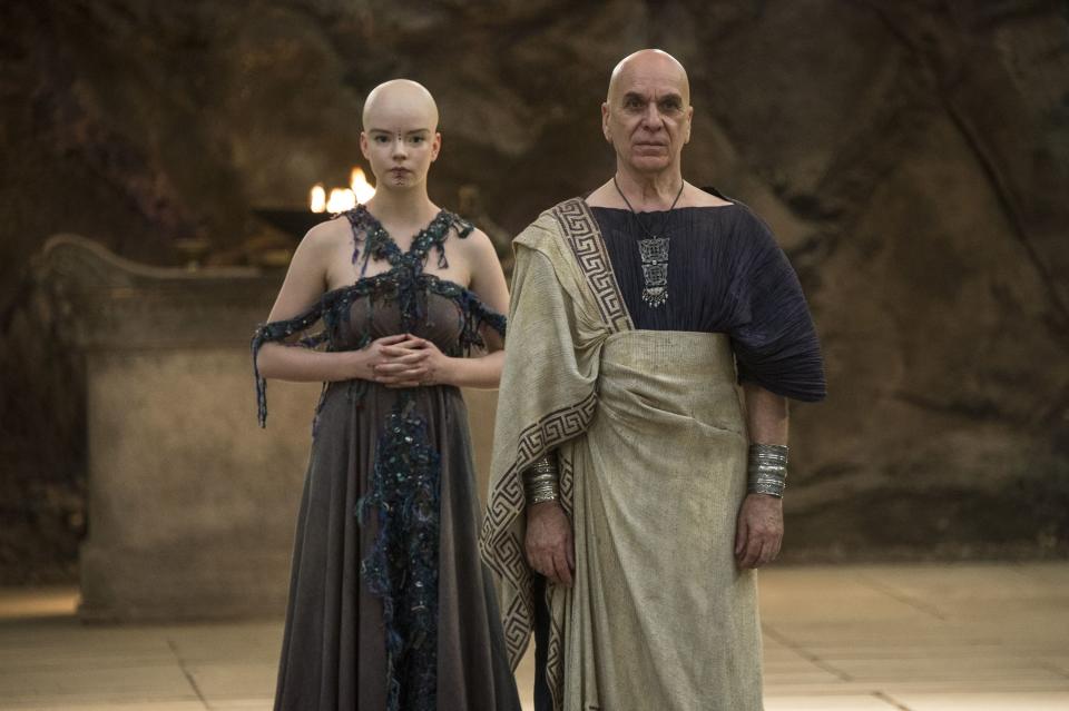 Anya Taylor-Joy and Ken Bones stand bald in tunics