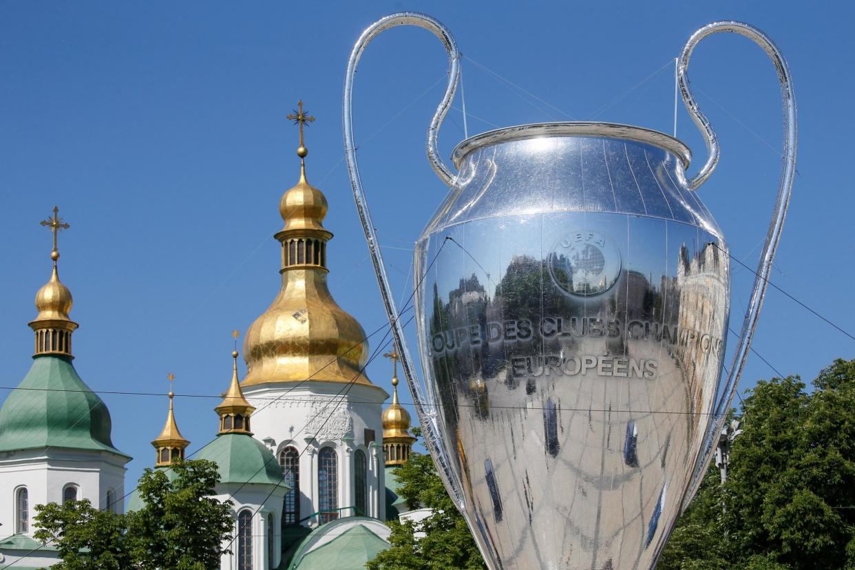 A giant replica of the UEFA Champions League trophy is on display in front of the Saint Sophia's Cathedral in central Kiev: REUTERS