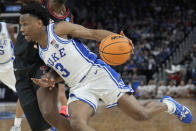 FILE - Duke guard Jeremy Roach (3) drives to the basket against Texas Tech during the second half of an NCAA men's college basketball tournament game in San Francisco, March 24, 2022. Roach is the lone returning starter and team captain coming off a strong postseason performance. He averaged 11.8 points, 2.8 rebounds and 3.0 assists in five NCAA Tournament games. (AP Photo/Tony Avelar, File)