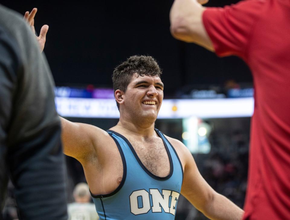 Alexander Berisha of Fox Lane celebrates after defeating Bryson Tibbs of Middletown in a 215-pound semifinal match during the NYSPHSAA Wrestling Championships at the MVP Arena in Albany Feb. 24, 2024.