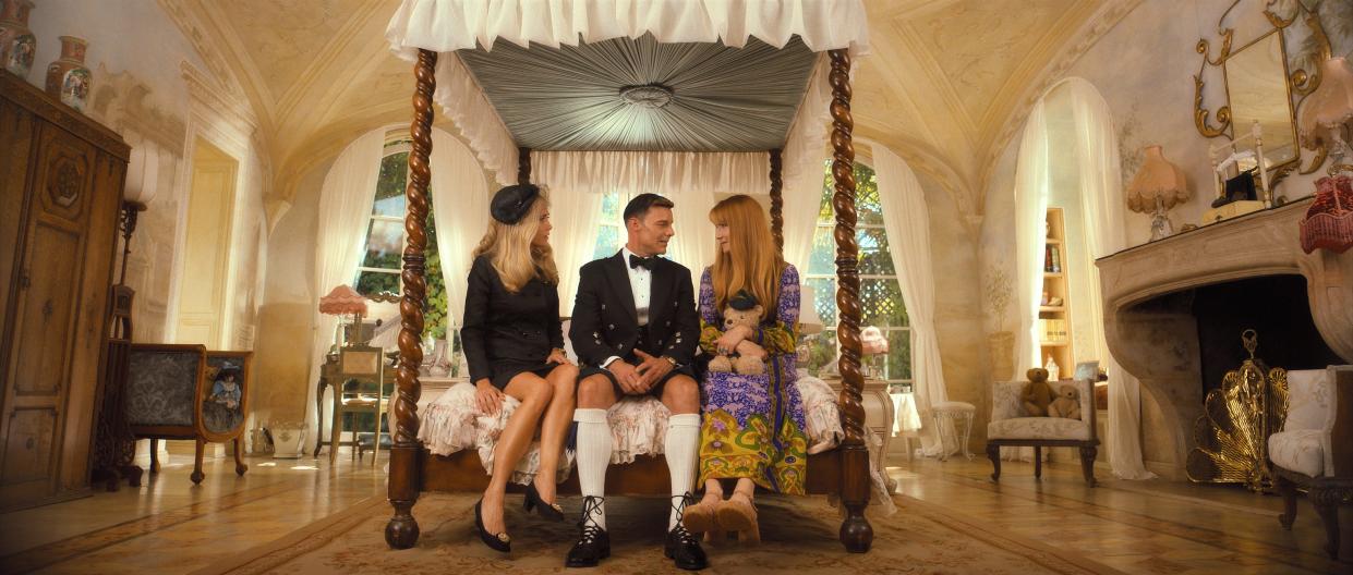 Kristen Wiig is Maxine (from left), Ricky Martin is Robert and Laura Dern is Linda in Season 1, Episode 7 of "Palm Royale" on Apple TV+.