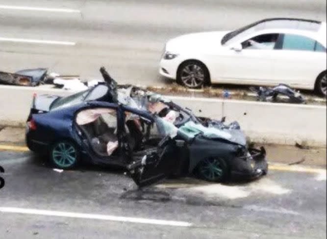 The Honda Civic was found in pieces on the highway. Photo: CBS