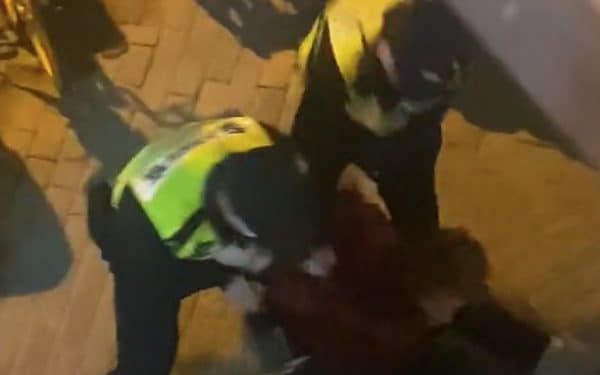 The BBC journalist was dragged to the ground by police in Shanghai - Twitter