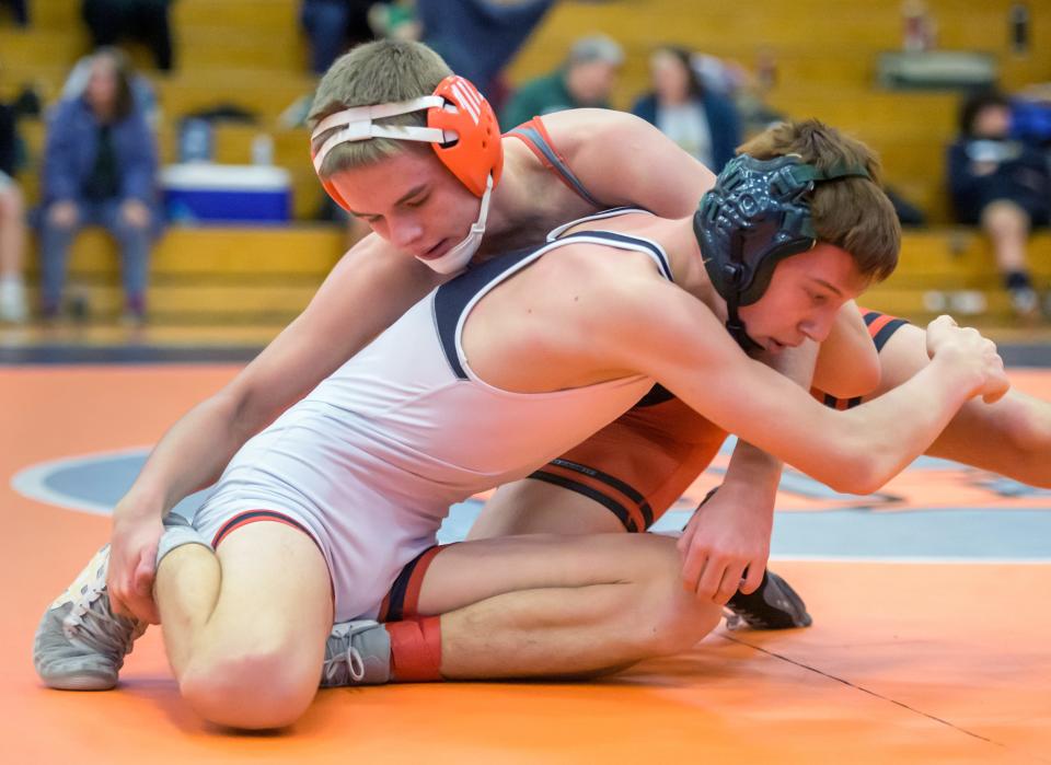 Washington's Wyatt Medlin, top, grapples with Metamora's Connor Graham in the 126-pound match of the Class 2A wrestling regional Saturday, Feb. 4, 2023 at Washington Community High School. Medlin won the match with a 17-2 technical fall.