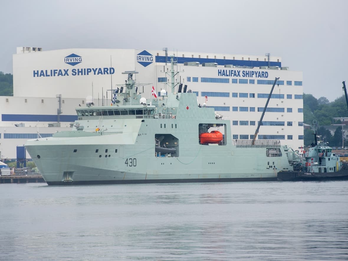 HMCS Harry DeWolf leaves the Irving-owned Halifax Shipyard on its way to being delivered to the Royal Canadian Navy dockyard in Halifax in 2020 (Andrew Vaughan/The Canadian Press - image credit)
