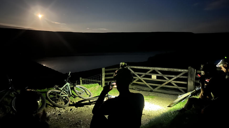 Riders resting in moonlight