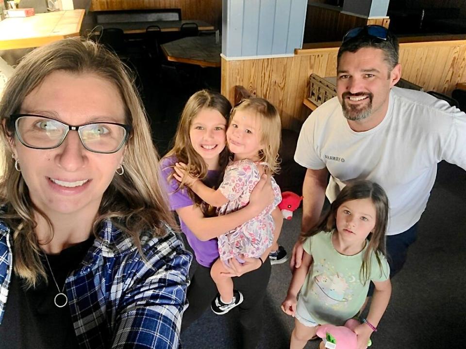 Owners Jamie and Martin Ponti, alongside their three girls, at Beachside Pizza in New Smyrna Beach.