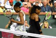 Mar 12, 2018; Indian Wells, CA, USA; Venus Williams (USA) and Serena Williams (USA) change sides during their third round match in the BNP Paribas Open at the Indian Wells Tennis Garden. Venus Williams won the match. Mandatory Credit: Jayne Kamin-Oncea-USA TODAY Sports