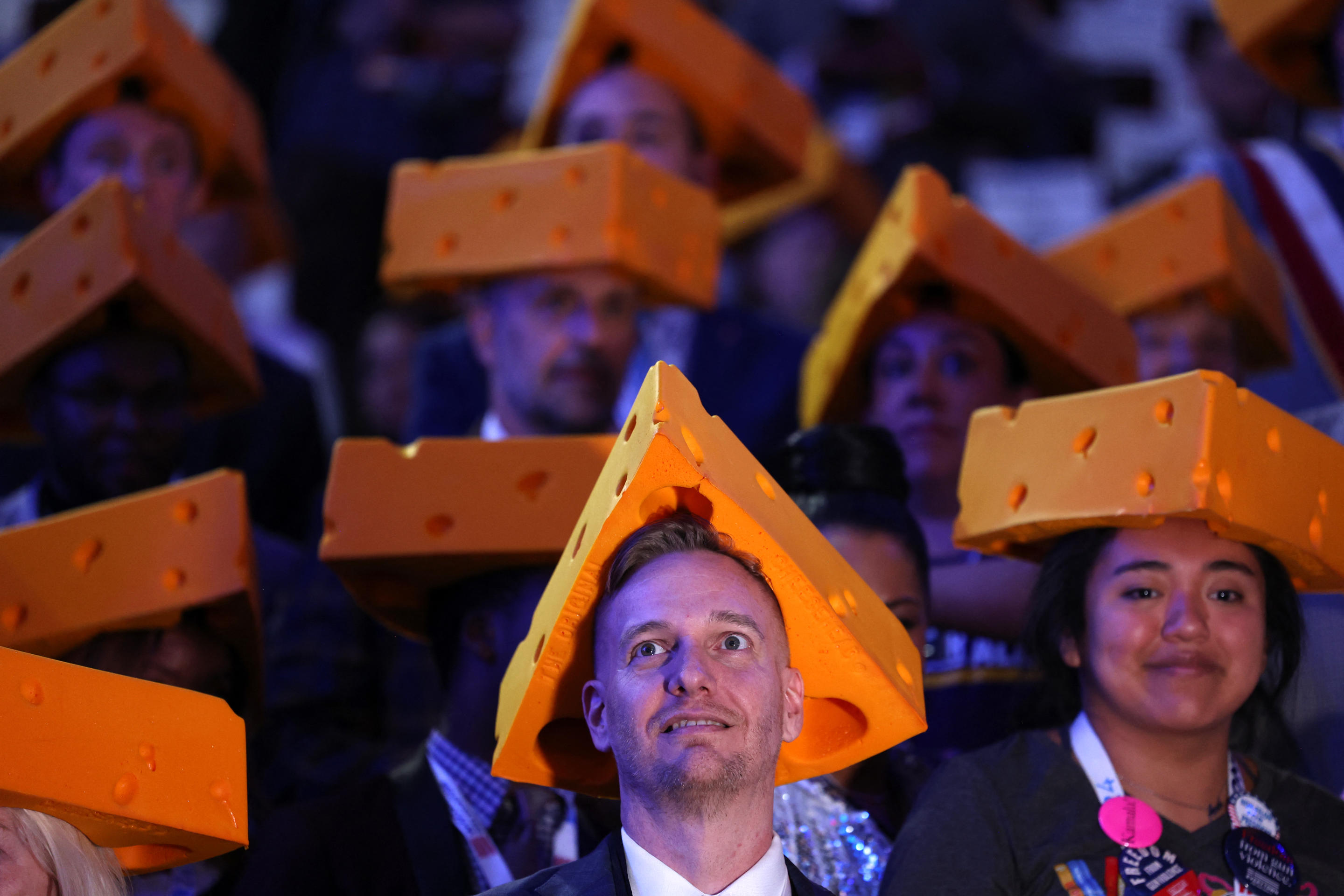 Delegates from Wisconsin wear cheeseheads to the convention on Tuesday. (Charly Triballeau/AFP via Getty Images)