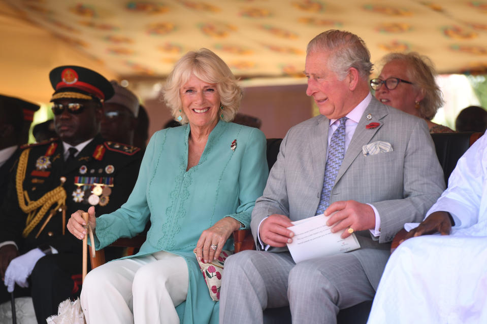 The Prince of Wales and Duchess of Cornwall at their official welcome ceremony in The Gambia on their royal tour (PA)