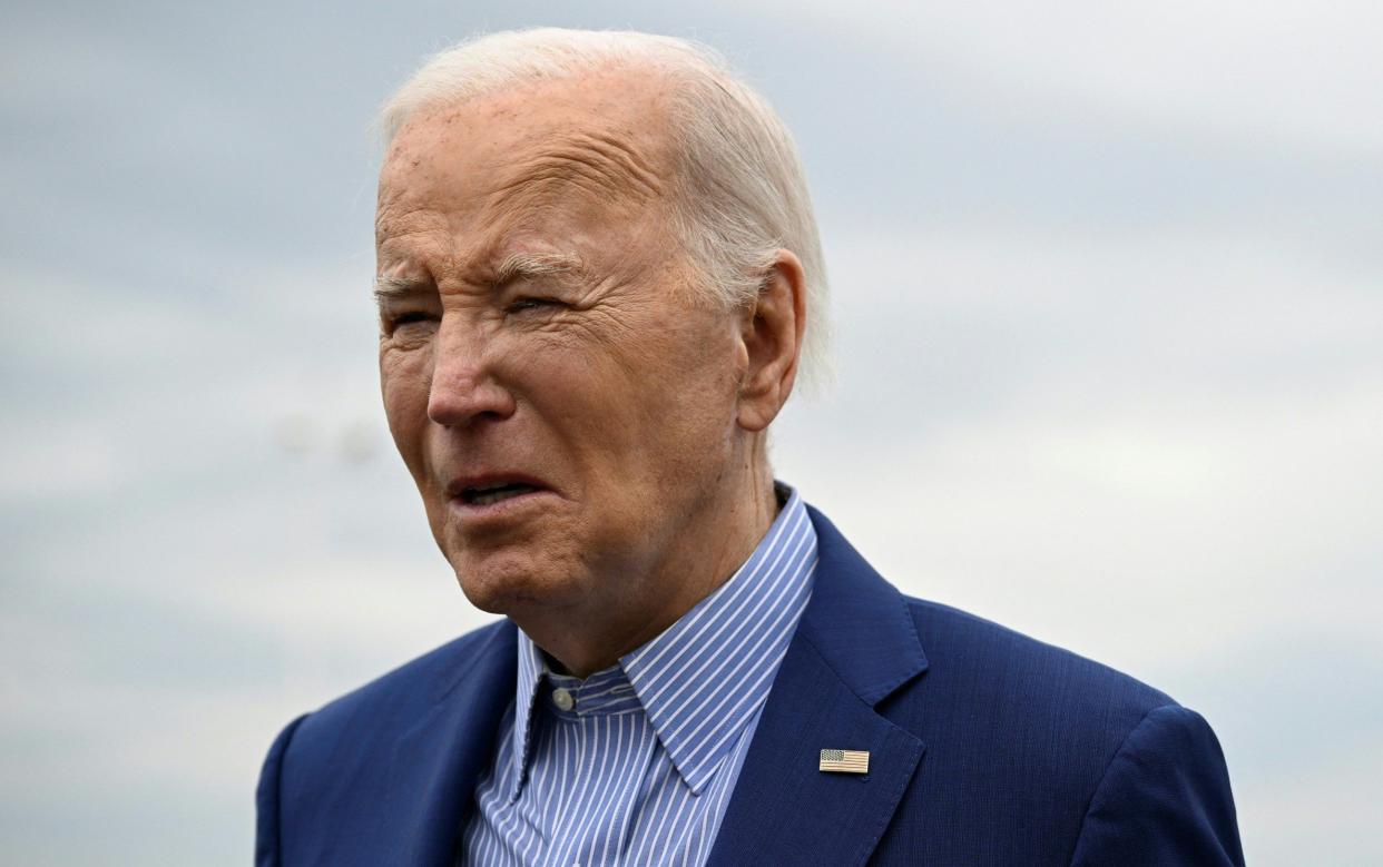 US President Joe Biden speaks to members of the media before boarding Air Force One