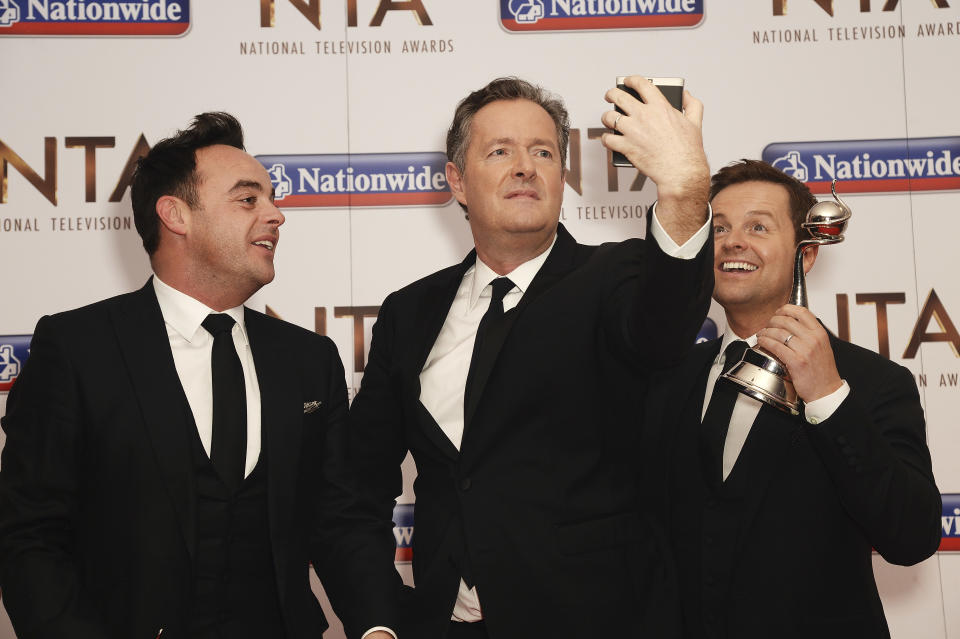 LONDON, ENGLAND - JANUARY 20:  Piers Morgan and Ant and Dec take a selfie during the 21st National Television Awards at The O2 Arena on January 20, 2016 in London, England.  (Photo by Dave J Hogan/Dave J Hogan/Getty Images)