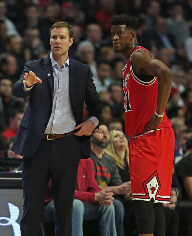 Head coach Fred Hoiberg of the Chicago Bulls talks to Jimmy Butler during their NBA game against the Golden State Warriors, at the United Center in Chicago, Illinois, on January 20, 2016