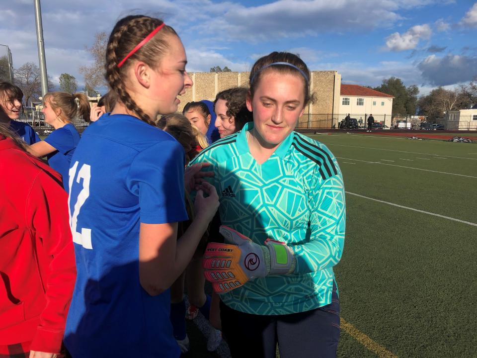 U-Prep junior goalkeeper Allyson Littau (right) is congratulated by junior defender Kassidy Conway (left) after leading the Panthers to a 1-0 shutout in the CIF NorCal Division IV state first round against Placer on Feb. 28, 2023.