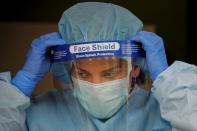 A nurse works at a drive-thru testing site for the coronavirus disease (COVID-19) at North Shore University Hospital in Manhasset, New York