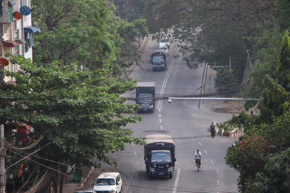 Myanmar's security forces deploy on Hledan road in Kamayut township of Yangon in Myanmar, Monday, March 29, 2021. Over 100 people across the country were killed by security forces on Saturday alone, including several children. Myanmar aircraft also carried out three strikes along the country's border overnight Sunday, according to a member of the Free Burma Rangers, a humanitarian relief agency that delivers medical and other assistance to villagers. (AP Photo)