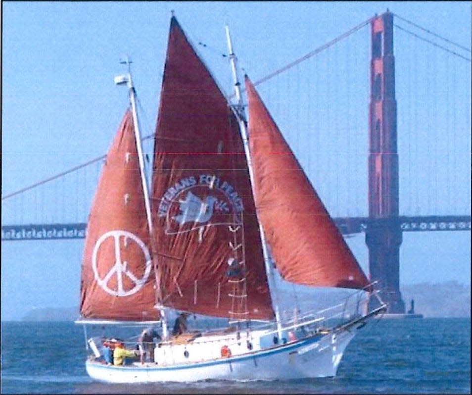 The Veterans for Peace sailboat Golden Rule is shown by the Golden Gate Bridge in San Francisco. The 30-foot ketch has sailed many miles in support of a mission to seek peaceful, effective alternatives to war — especially nuclear war. The ketch will be at Providence’s India Point Park on June 11 and 12.