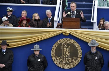 Virginia Governor Terry McAuliffe delivers his inaugural address after being sworn in, in Richmond, Virginia, January 11, 2014. REUTERS/Mike Theiler