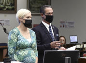 Orange County Senior Deputy District Attorney Whitney Bokosky, left, and Orange County District Attorney Todd Spitzer address Judge Larry Yellin during a hearing for Marcus Eriz and Wynne Lee at the Central Justice Center in Santa Ana, Calif., Friday, June 18, 2021. Eriz, 24, charged with the murder of a 6-year-old boy in a road rage incident was ordered held without bail Friday. Eriz, and Lee, both pleaded not guilty to the charges they face through their attorneys. Lee, is charged with being an accessory after the fact, and the judge requested more information before setting her bail. (Frederick M. Brown/Pool via AP)