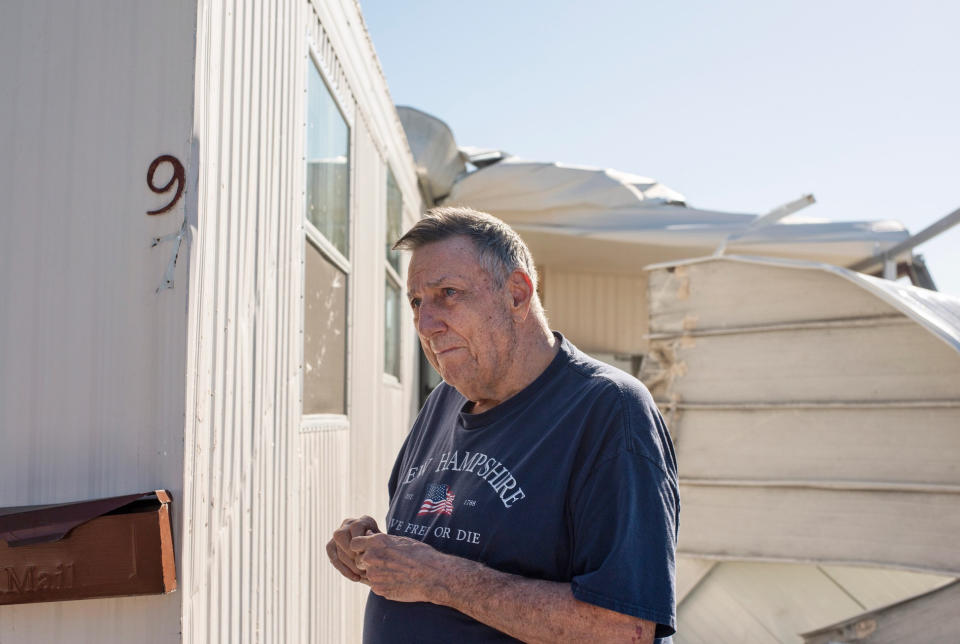Fred Newhall outside his damaged home in Fort Myers, Fla., on Sept. 30, 2022. (Tina Russell for NBC News)