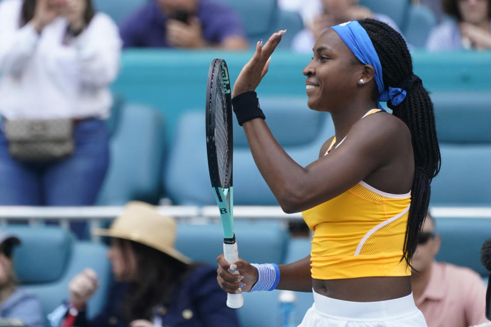 Coco Gauff celebrates after beating Wang Qiang of China, 7-5, 6-4, during the Miami Open tennis tournament, Friday, March 25, 2022, in Miami Gardens, Fla. (AP Photo/Wilfredo Lee)