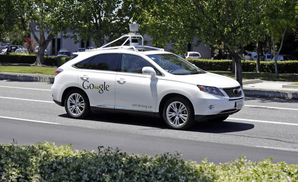 FILE - This May 13, 2014, file photo shows a Google self-driving Lexus at a Google event outside the Computer History Museum in Mountain View, Calif. Google will release monthly reports on the performance of its self-driving cars, and it disclosed summaries of the accidents that involved the vehicles. The company said Friday, June 5, 2015, as it has in the past, that its cars were not to blame for any of the accidents. (AP Photo/Eric Risberg, File)