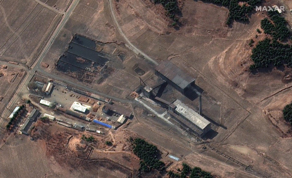 This Tuesday, March 2, 2021 satellite image provided by Maxar Technologies shows a steam plant near North Korea’s main atomic complex in Yongbyon, North Korea. Smoke was observed emanating from the plant’s smokestack at various times from late February and early March. North Korea may be trying to extract plutonium to make more nuclear weapons at the complex, recent satellite photos indicated, weeks after leader Kim Jong Un vowed to expand his nuclear arsenal. (Satellite image ©2021 Maxar Technologies via AP)