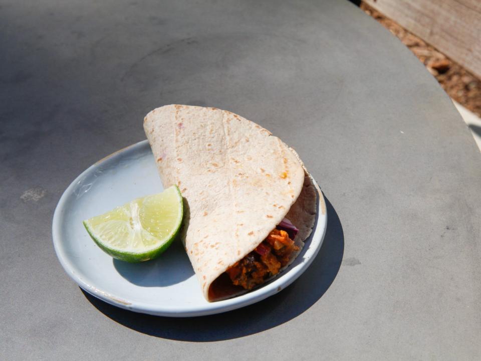 tortilla with lime on a plate