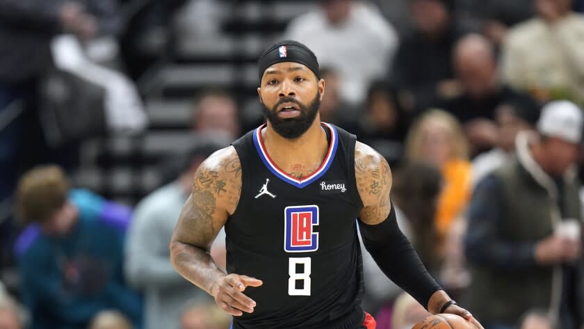 Los Angeles Clippers forward Marcus Morris Sr. (8) brings the ball up court.