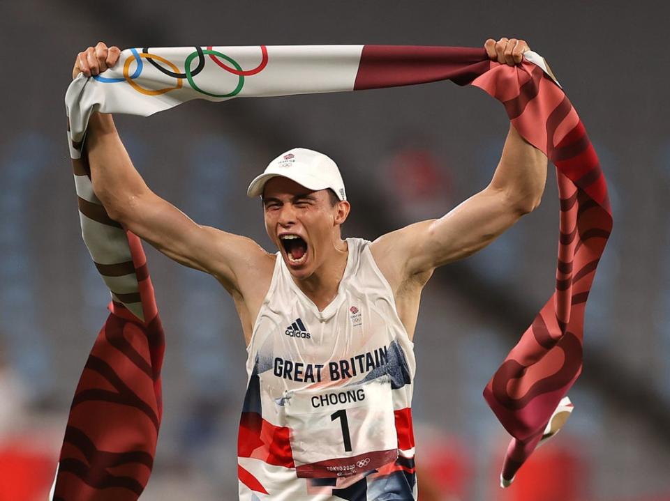 Joseph Choong celebrates after winning the laser run and Olympic gold (Getty Images)