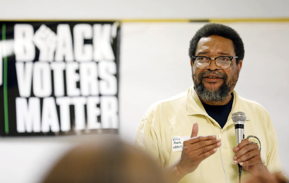 In this Aug. 24, 2018 photograph, Frank Figgers, a consultant for One Voice, a non-partisan policy advocacy and leadership development non-profit organization, addresses a Black Women Matter Issues Forum with several Mississippi grassroots political organizations and the Black Voters Matter field team at the MW Stringer Grand Lodge in Jackson, Miss. Figgers spoke about the Mississippi Freedom Democratic Party being started at the lodge in the 1960s. The meeting was the final portion of a bus tour that was in part to introduce national media to these hands-on organizations and to allow the groups to interact and build interest and excitement for the upcoming election, developing concern for local issues, and documenting the campaigning in locales where black turnout might be key to winning. (AP Photo/Rogelio V. Solis)