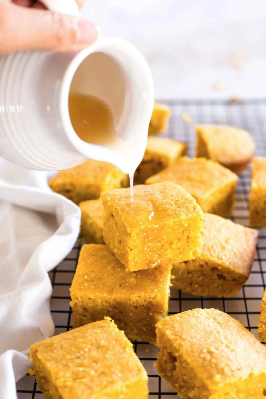 <p>Dish by Dish</p><p>This easy gluten-free pumpkin cornbread has a moist yet toothy bite, with the perfect amount of pumpkin flavor. Totally dairy-free too. </p><p><strong>Get the recipe: <em><a href="https://www.dishbydish.net/gluten-free-pumpkin-cornbread/" rel="nofollow noopener" target="_blank" data-ylk="slk:Moist Gluten-Free Pumpkin Cornbread;elm:context_link;itc:0;sec:content-canvas" class="link rapid-noclick-resp">Moist Gluten-Free Pumpkin Cornbread</a></em></strong></p>