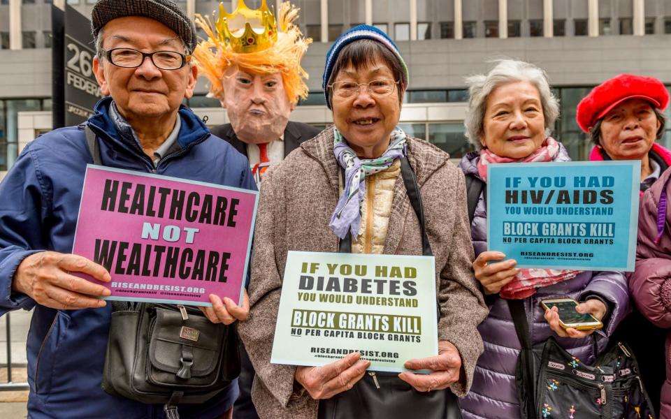 Street theater protesting Trump's Health Plan in New York city, 21 March - Credit: Erik M / Pacific/Barcroft Images