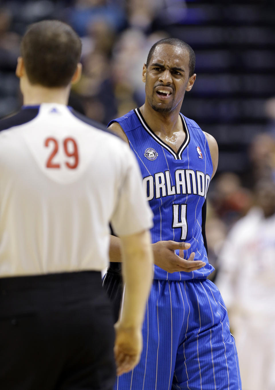 Orlando Magic guard Arron Afflalo continues to question referee Mark Lindsay after he was charged with a technical foul in the second half of an NBA basketball game against the Indiana Pacers in Indianapolis, Monday, Feb. 3, 2014. The Pacers defeated the Magic 98-79. (AP Photo/Michael Conroy)
