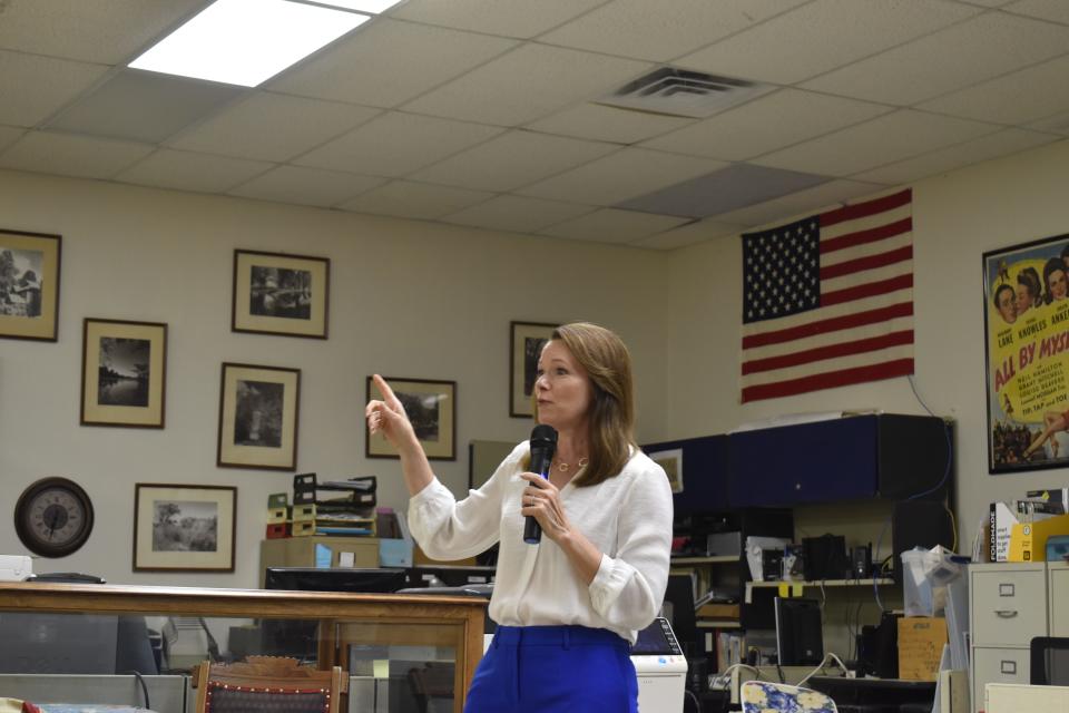 Christina Bohannan speaks to a crowd of supporters at the Warren County Historical Society in Indianola, Iowa on June, 22, 2022