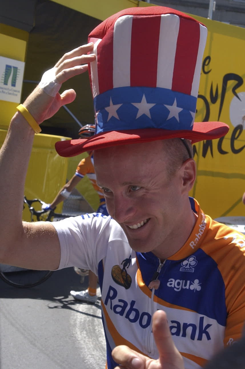 In this photo taken July 15 2004, US cyclist and Rabobank Cycling team member Levi Leipheimer jokes prior to the start of the Tour de France cycling race in Limoges, France. The Radobank cycling team announced Friday Oct. 19, 2012, it would pull out professional cycling by the end of 2012 after reading the scathing USADA report, in which Leipheimer, amongst others, conceded to using banned EPO drugs. Eleven teammates of Lance Armstrong on the U.S. Postal Service Cycling Team have turned on him offering evidence and testimony to back up allegations that Armstrong used performance-enhancing drugs in competition, the USADA said. (AP Photo/Peter Dejong)