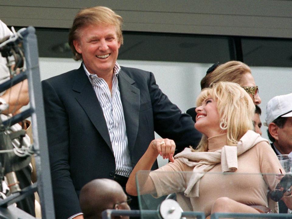 Donald Trump talks and then-wife Ivana at the men’s final of the 1997 US Open (Reuters)