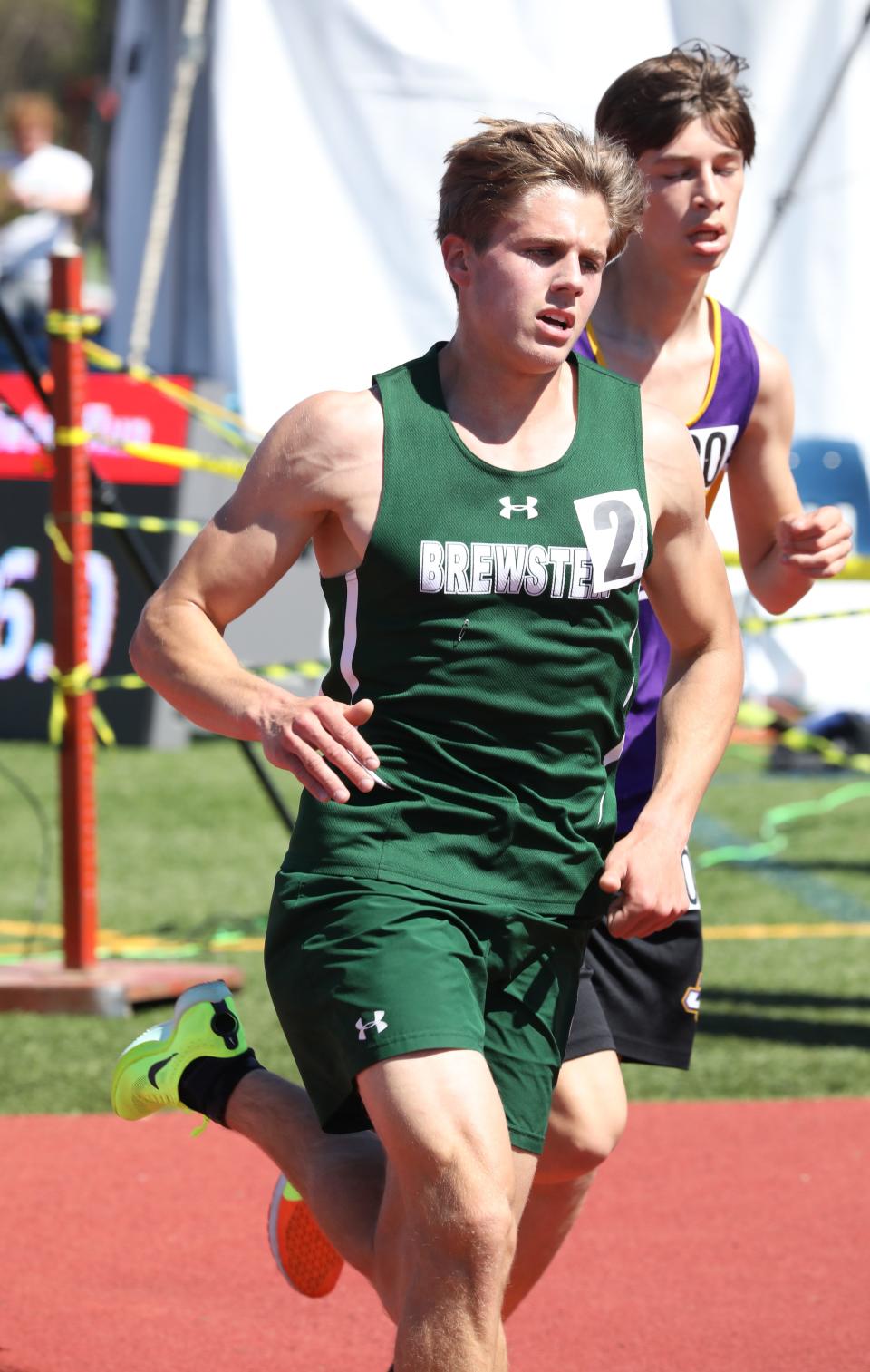 Patrick Ford from Brewster leads the way as athletes compete in the boys 3200 meter run during the 45th annual Joe Wynne Somers Lions Club Invitational at Somers High School, May 6, 2023. 